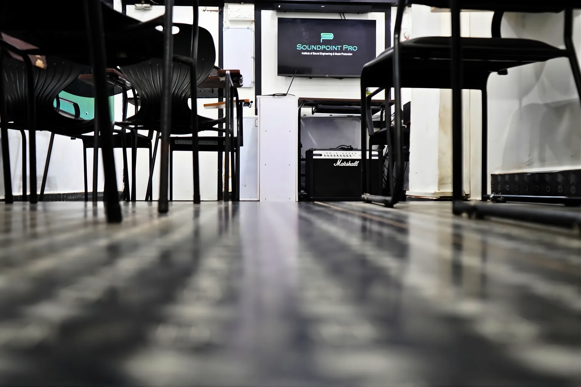 Modern classroom interior for audio engineering theory sessions